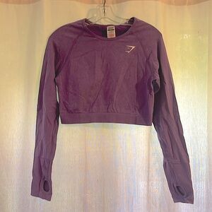 Long sleeve purple stretchy cropped GYMSHARK shirt with thumb holes